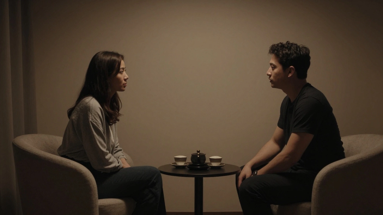 Two people in a quiet lounge, one listening intently, no faces clearly shown, conveying emotional connection without physicality.